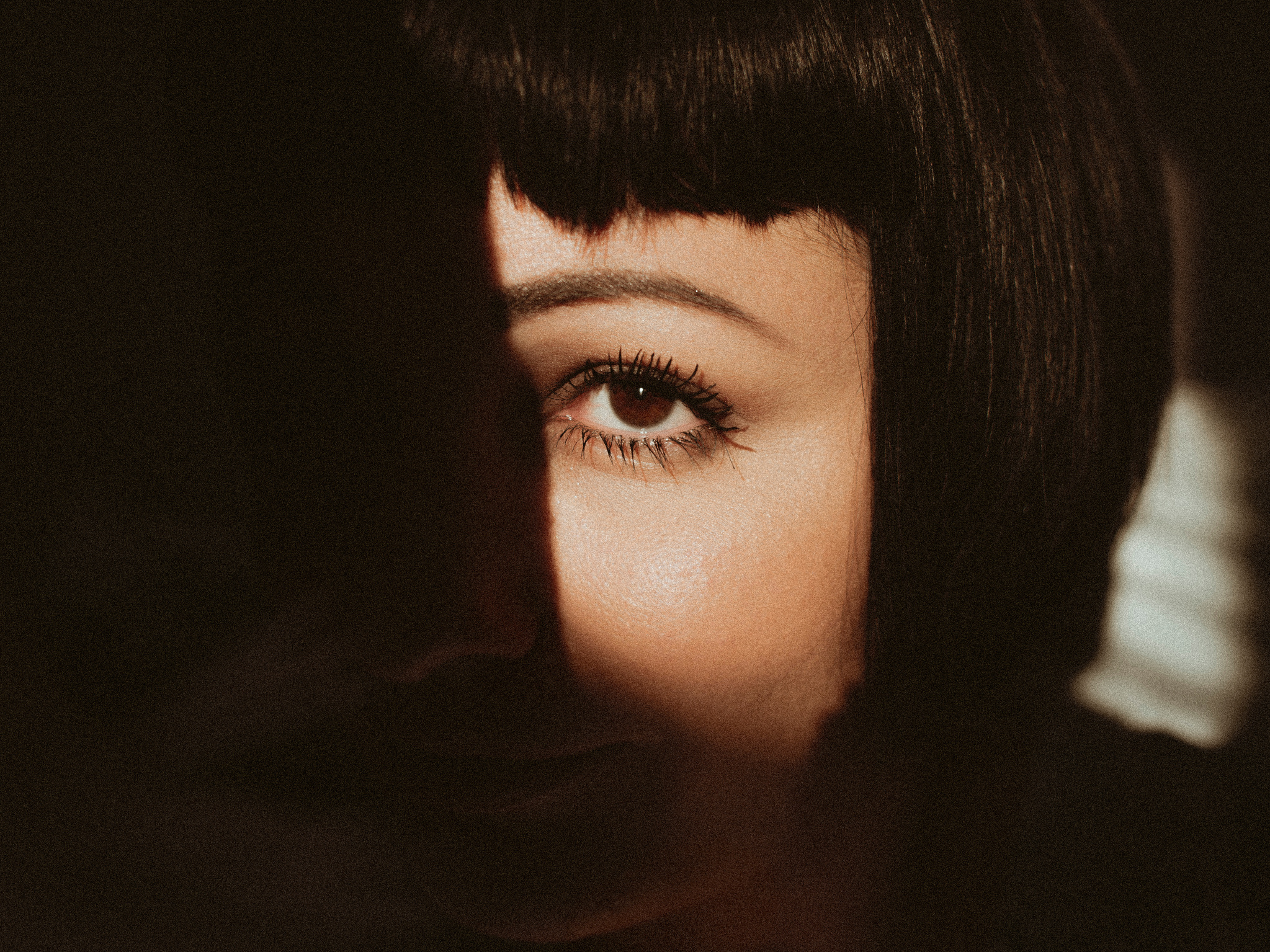 Close-Up Photo of Woman With Dark Hair